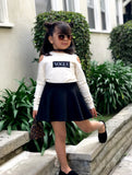 Open shoulder "VOGUE" sweater